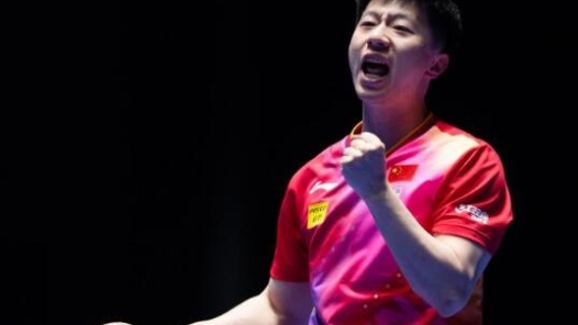 乒乓球——澳门世界杯：马龙晋级八强